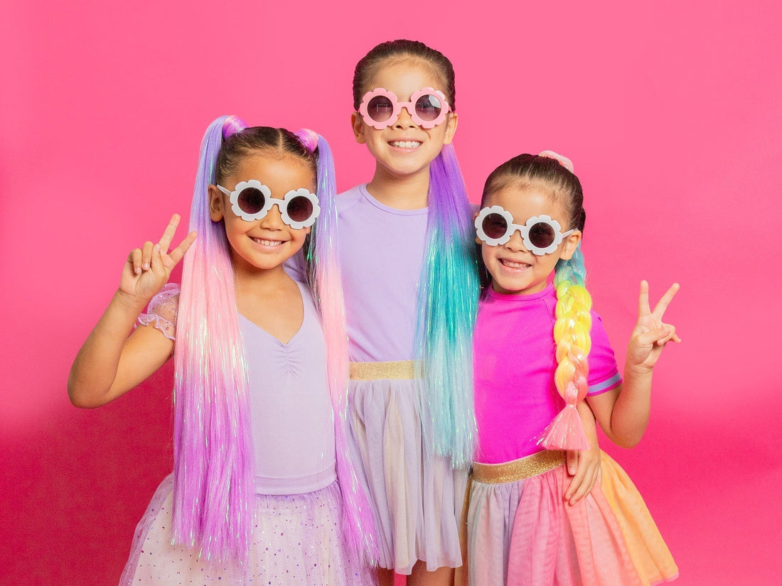 3 girls wearing Toot Sweet mermaid ponytails available in a range of colours from Little Herberts online or in our Perth salon and store